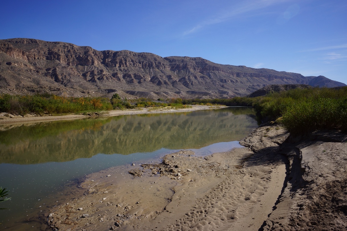 walking along the rio grande river in mexico towards boquillas canyon