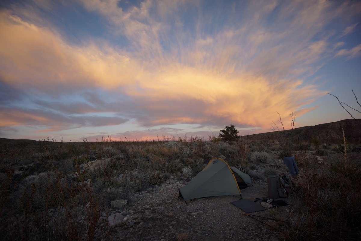 orange sky behind tent mariscal canyon overlook big bend