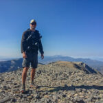Eric Poulin on the Summit of Mt Moriah, Bain and Range Trail Thru Hike 2020