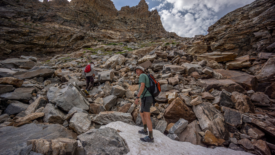 hikers climbing mountain pass in ruby range nevada