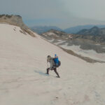 Hiker Traversing Snowfield Wallowa Mountains Hike