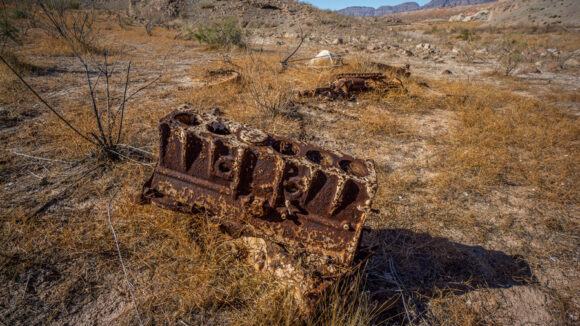 old engine along shore of lake mead